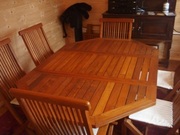 Teak extending dining table and chairs